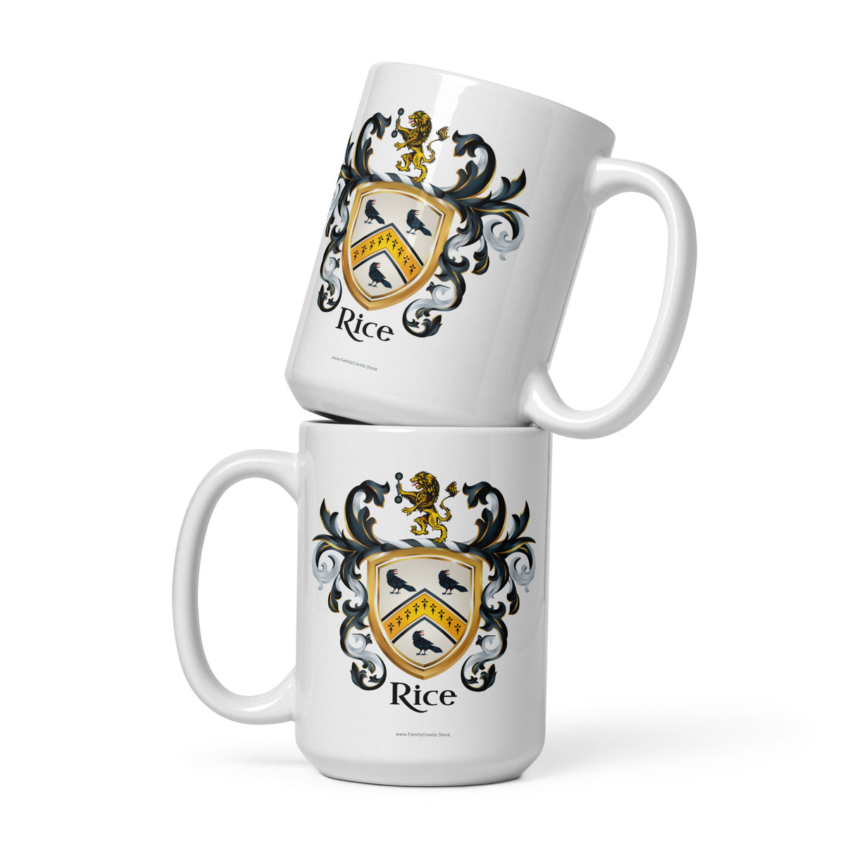 Two white ceramic mugs stacked with one on top of the other, featuring a printed family crest design with the name 'Rice' and black birds on a gold shield.