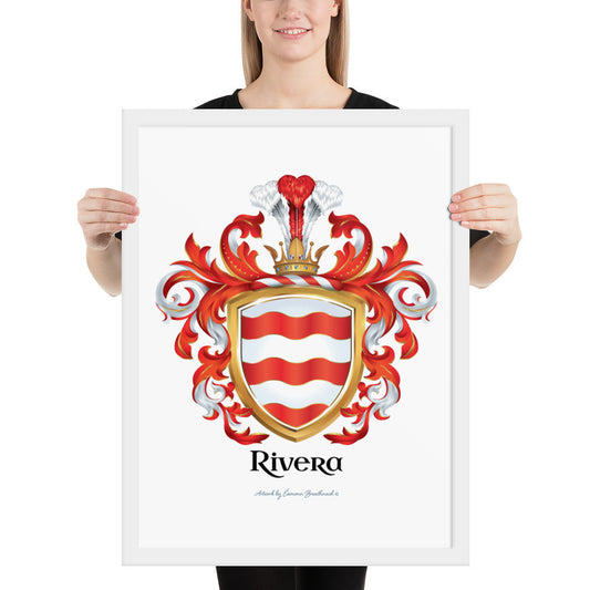 A woman standing in a white background, holding a white framed print of the Rivera Family Crest featuring 3 wavy red bands on a white shield
