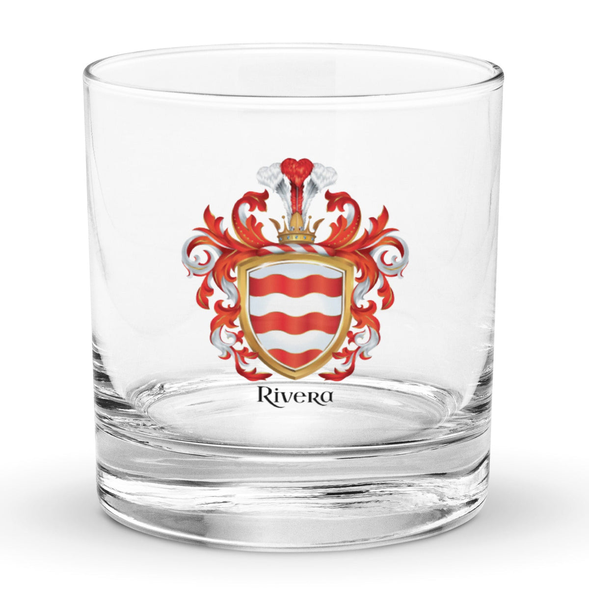 A clear classic heavy base rocks glass on a white background, printed with the Rivera Family Crest featuring 3 wavy red bands on a white shield