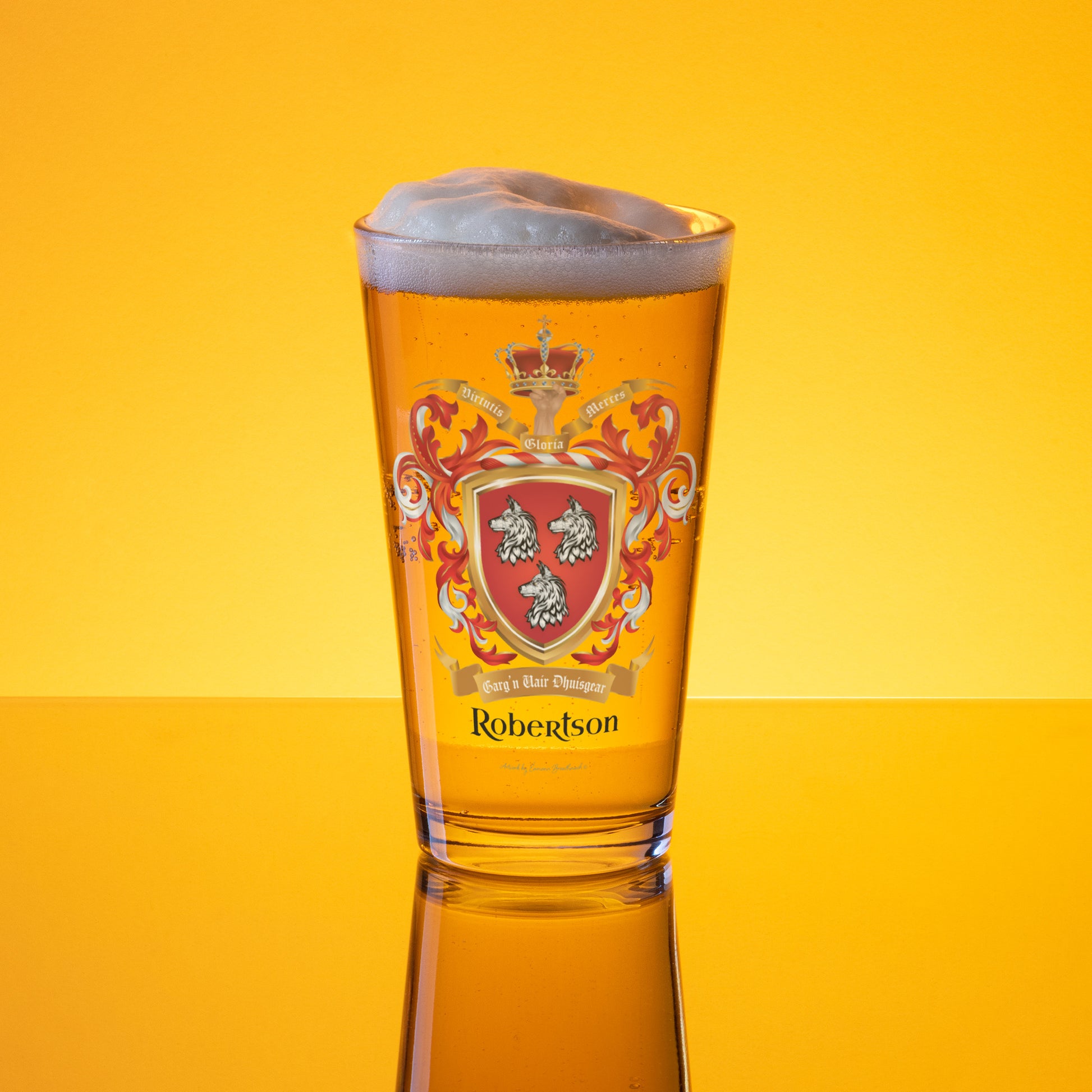 Pint glass with a Robertson Family Crest design and 'Robertson' text on a yellow background