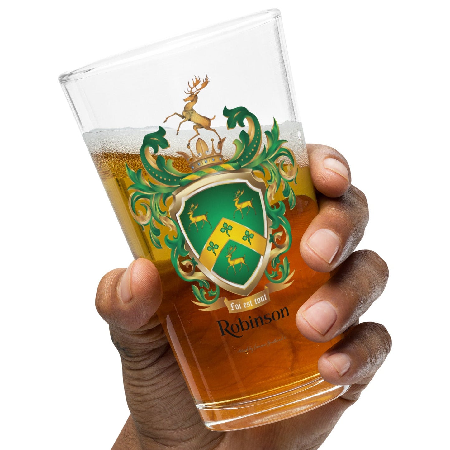 Hand holding a glass of beer with a Robinson Family Crest on a white background