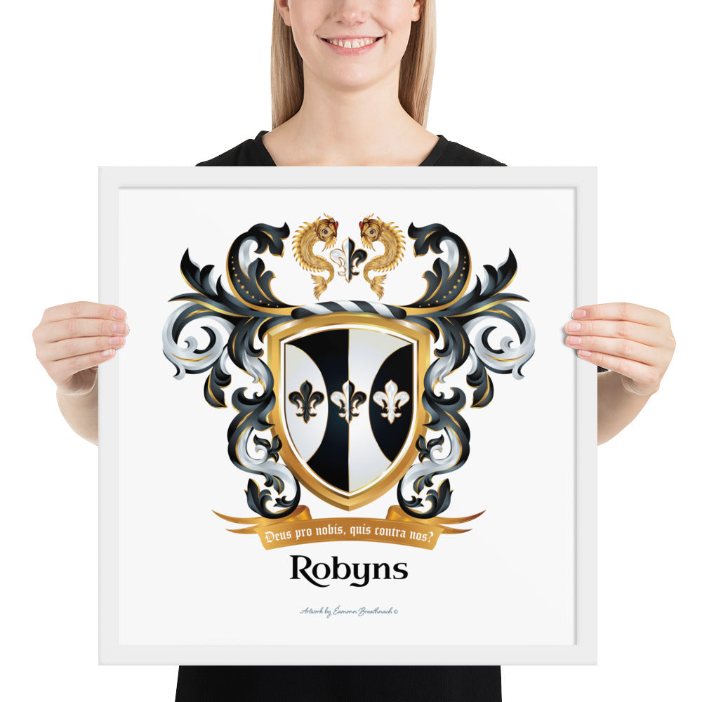 A woman holding a framed artprint of the Robyns Family Crest 