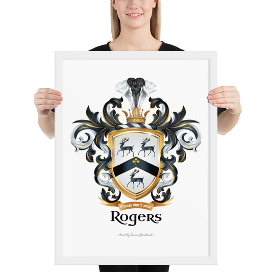 A woman standing in a white background, holding a white framed print of the Rodgers Family Crest which features 3 black stags and a black chevron on a white shield.