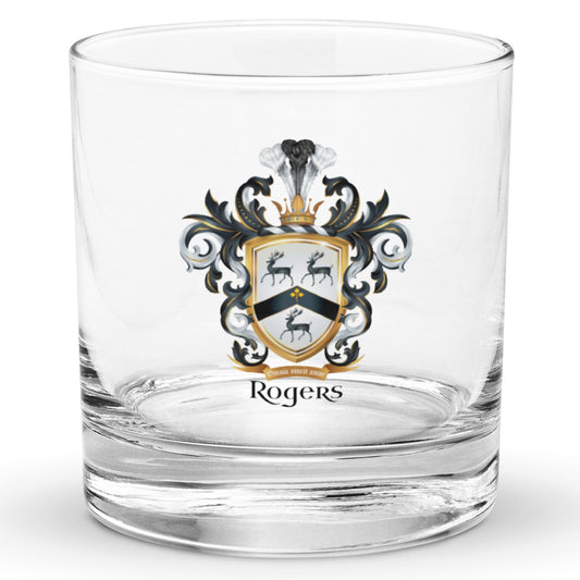 A clear classic heavy base rocks glass on a white background, printed with the Rogers Family Crest which features 3 black stags and a black chevron on a white shield.