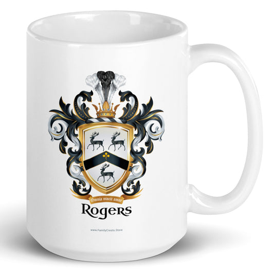 A white mug with handle to right, on a white background, printed with the Rogers Family Crest which features 3 black stags and a black chevron on a white shield.