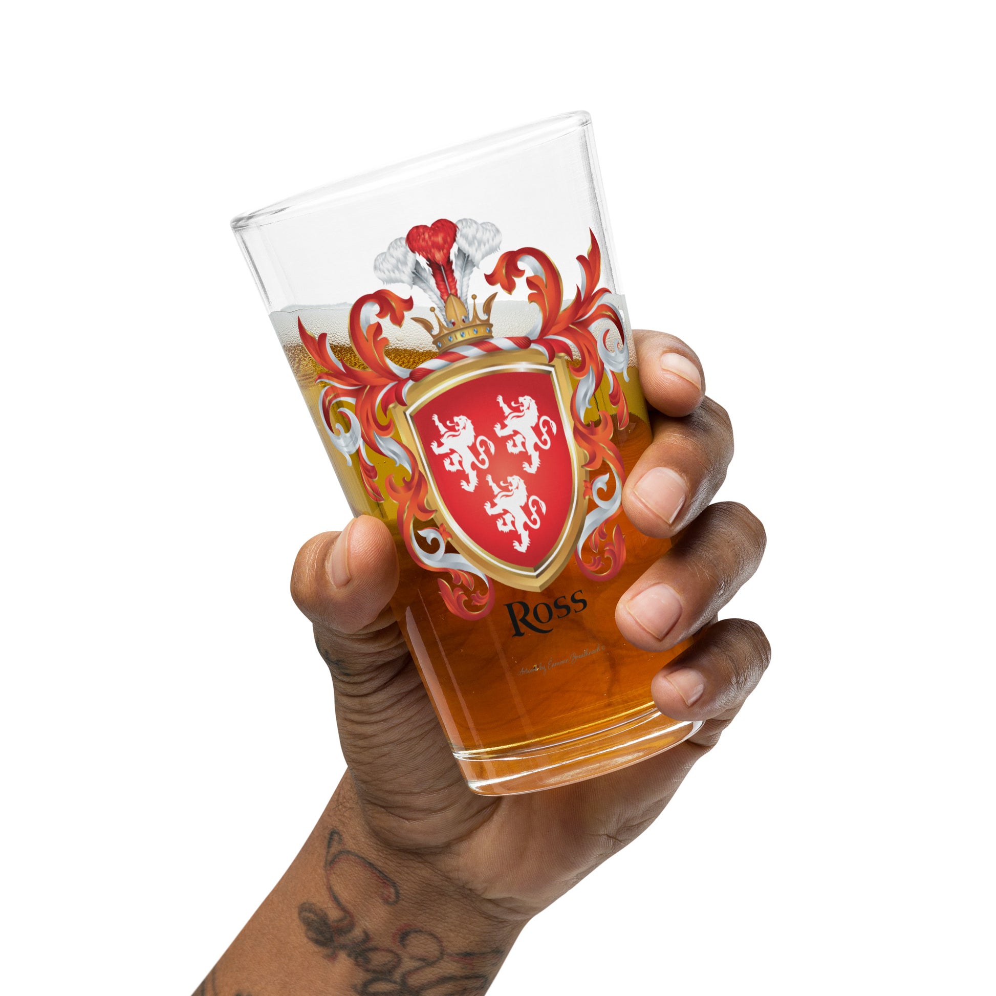 Hand holding a glass with a crest design and 'Ross' branding on a white background