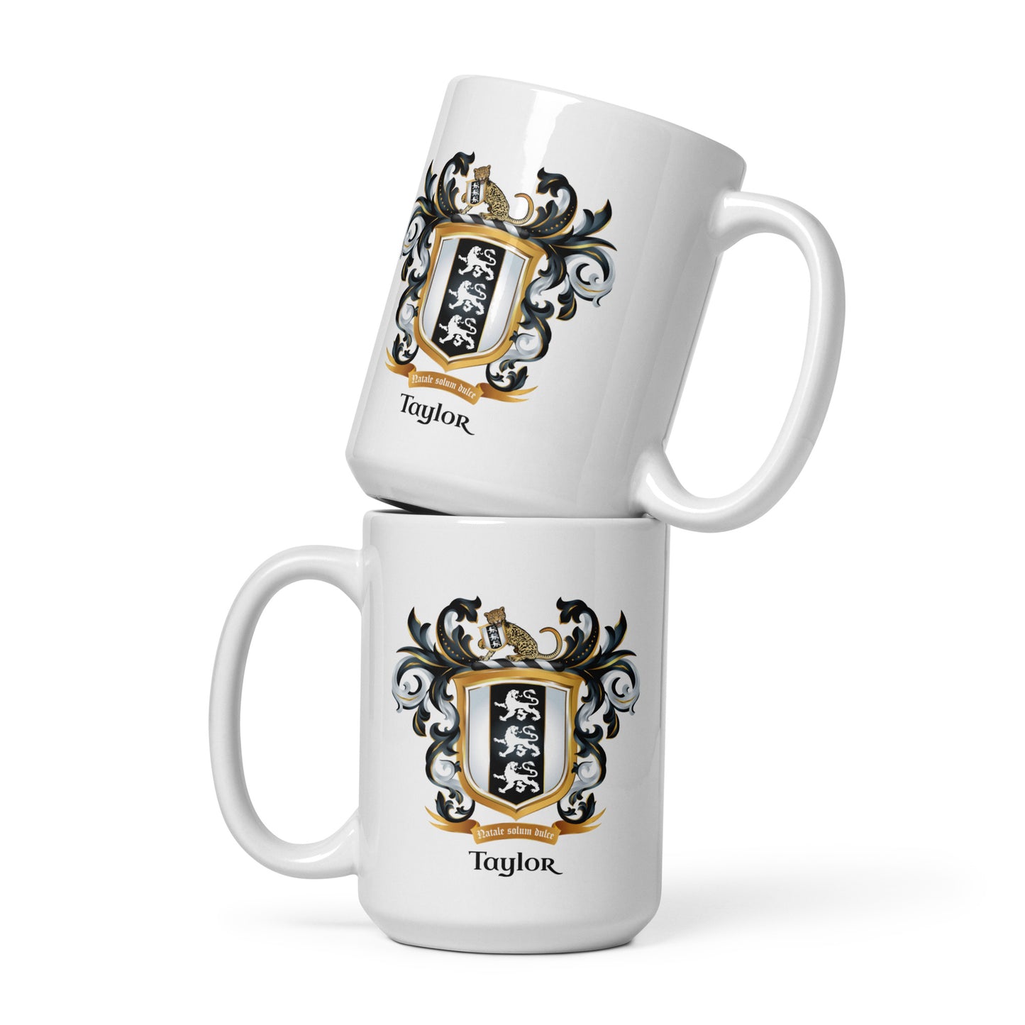 Two white mugs stacked on top of each other with a family crest and 'Taylor' text