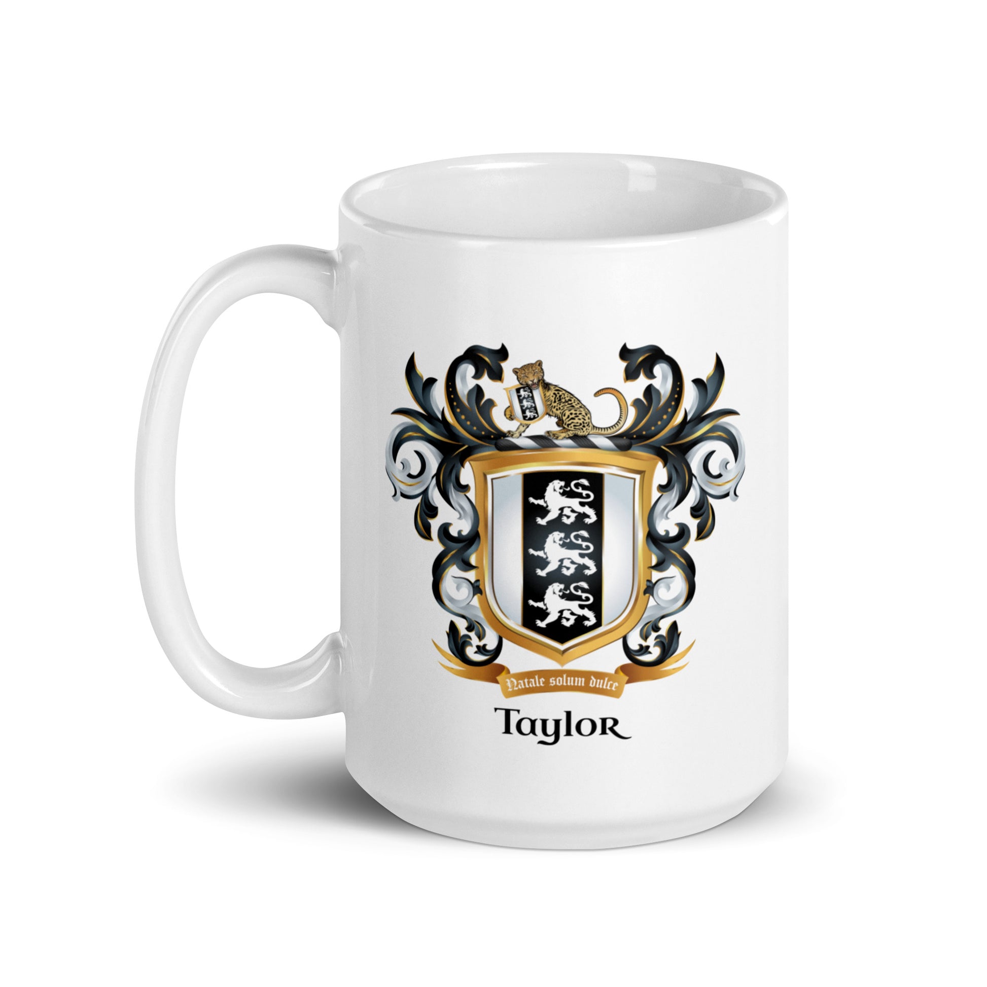 A white mug with Taylor family crest and the name 'Taylor' in black text below the shield that has 3 white lions on a black and white shield pictured against a white backdrop