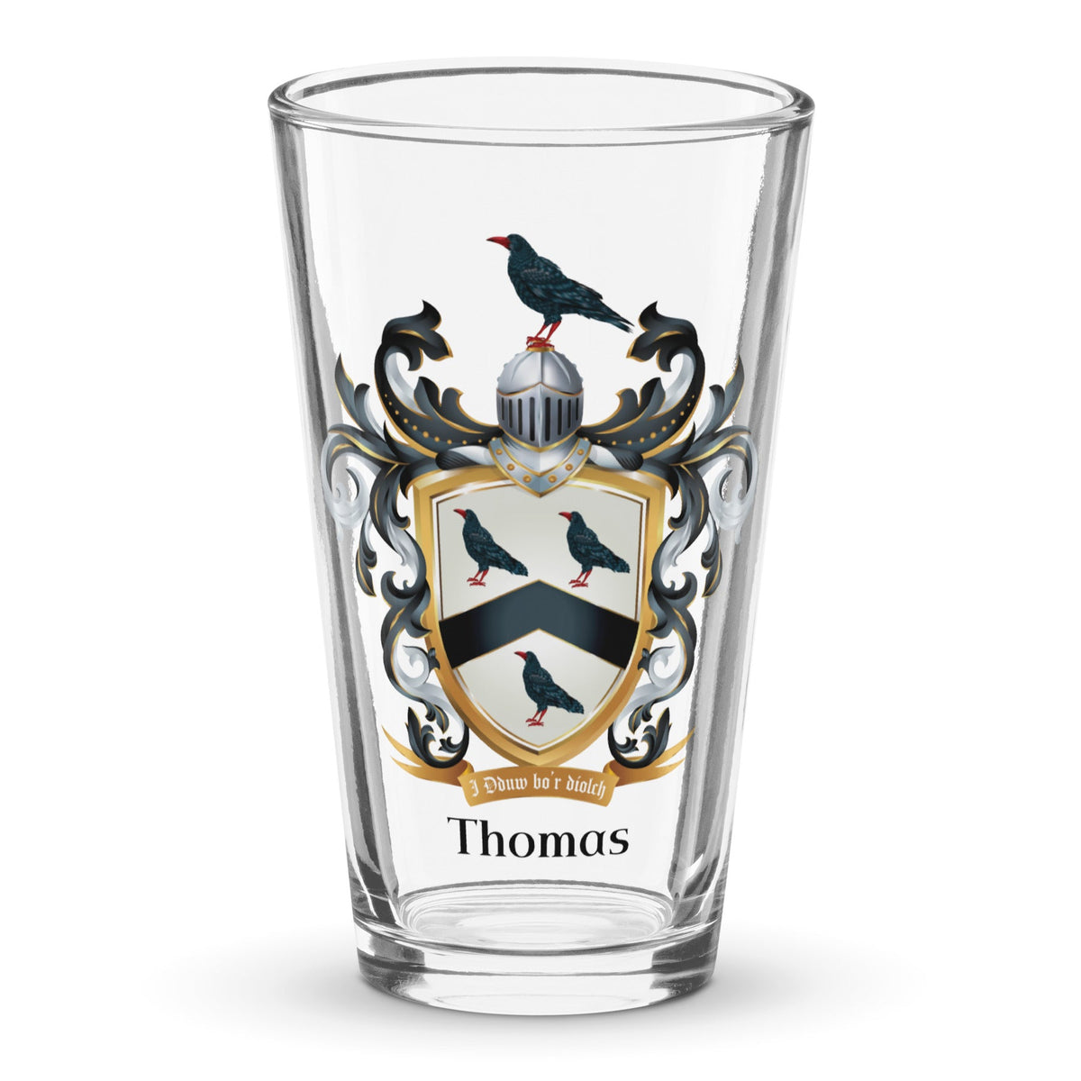 Clear classic pint beer glass with a Thomas Family Crest  featuring 3 black crows and a chevron, on a white background.