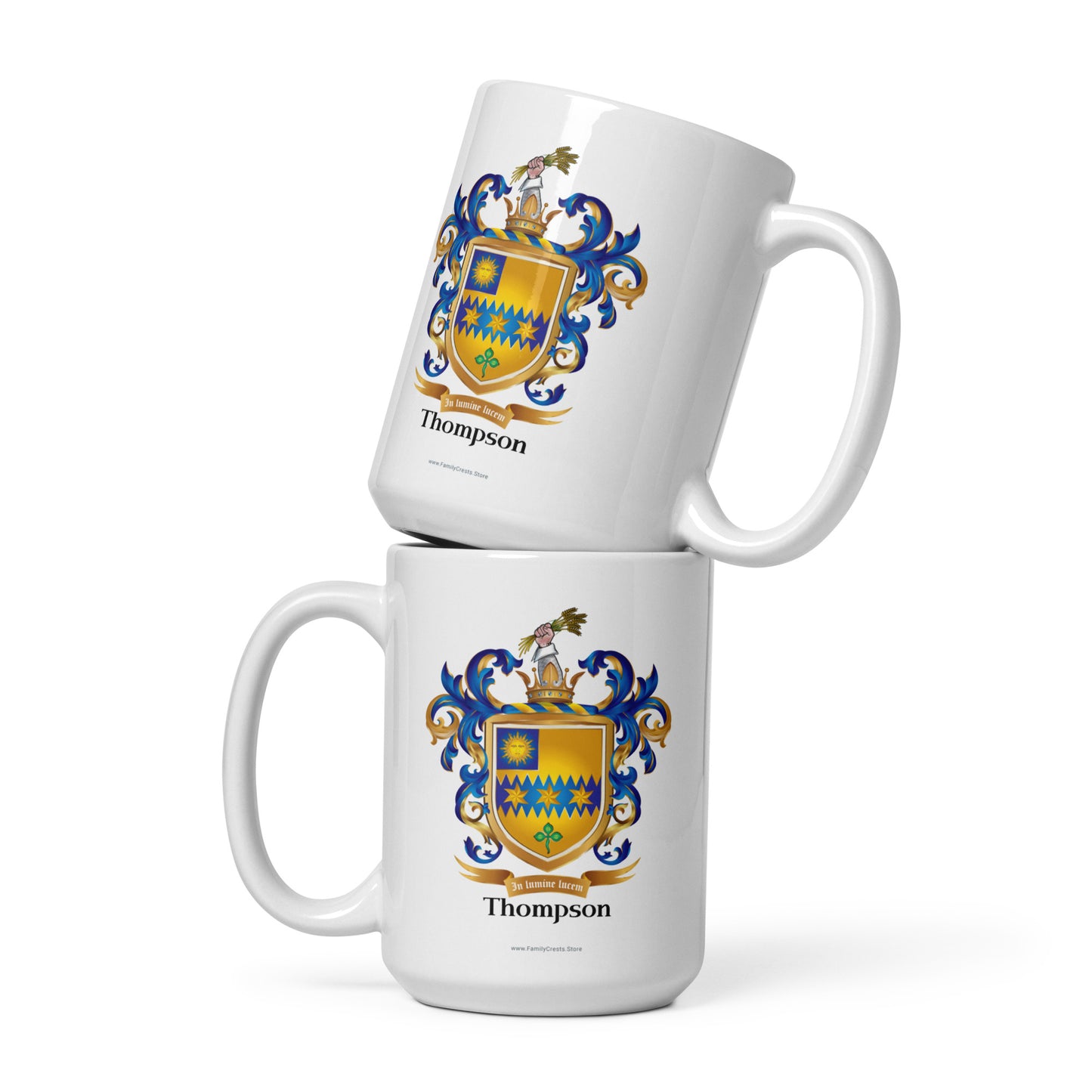 Two white mugs with a family crest and 'Thompson' text on a white background
