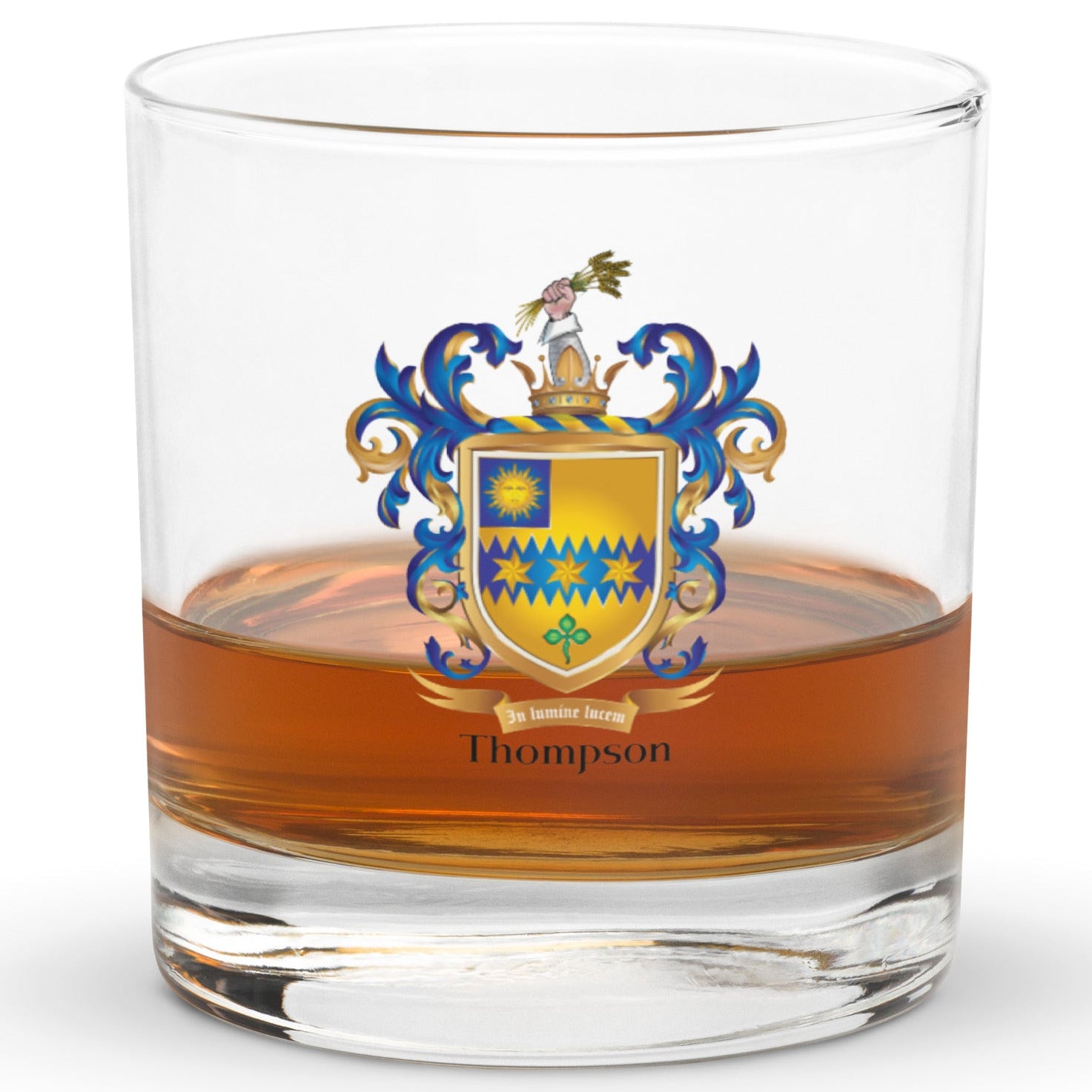Whiskey glass with a family crest and the name 'Thompson' on a white background