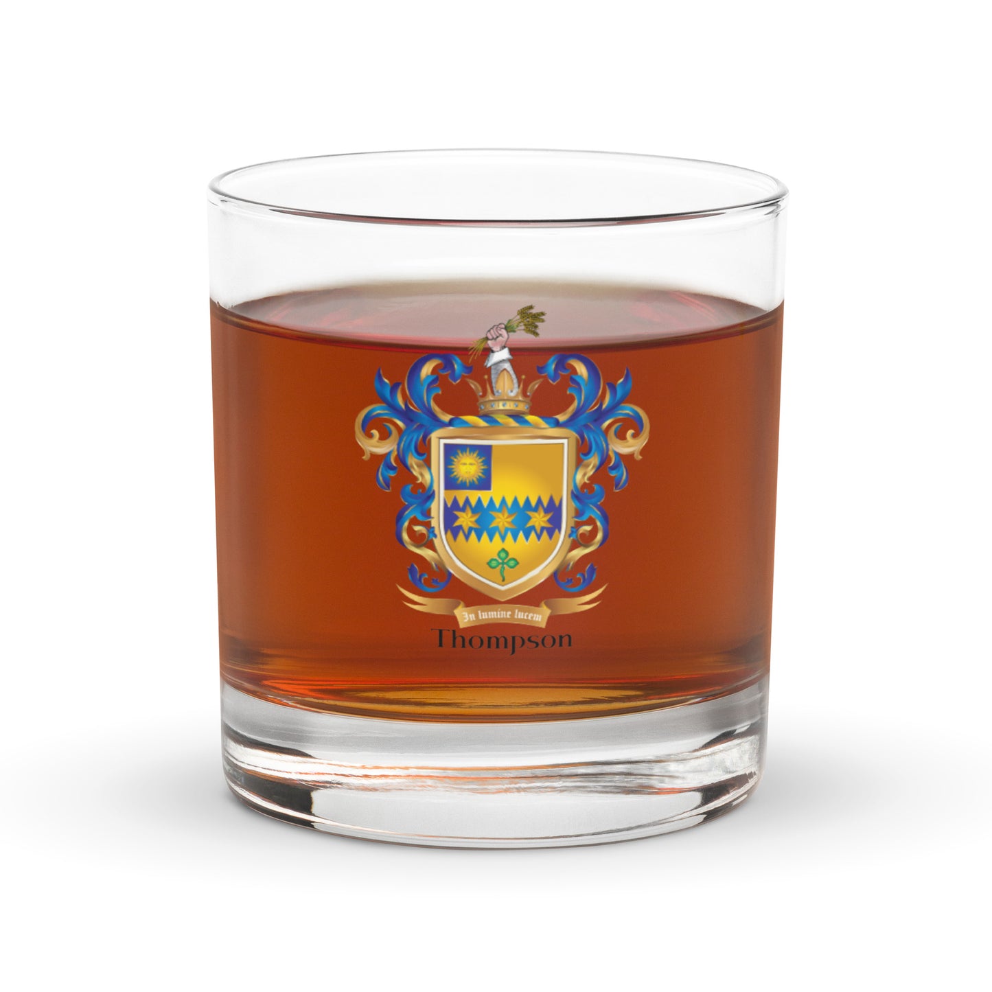 Glass of whiskey with a coat of arms emblem and 'Thompson' text on a white background