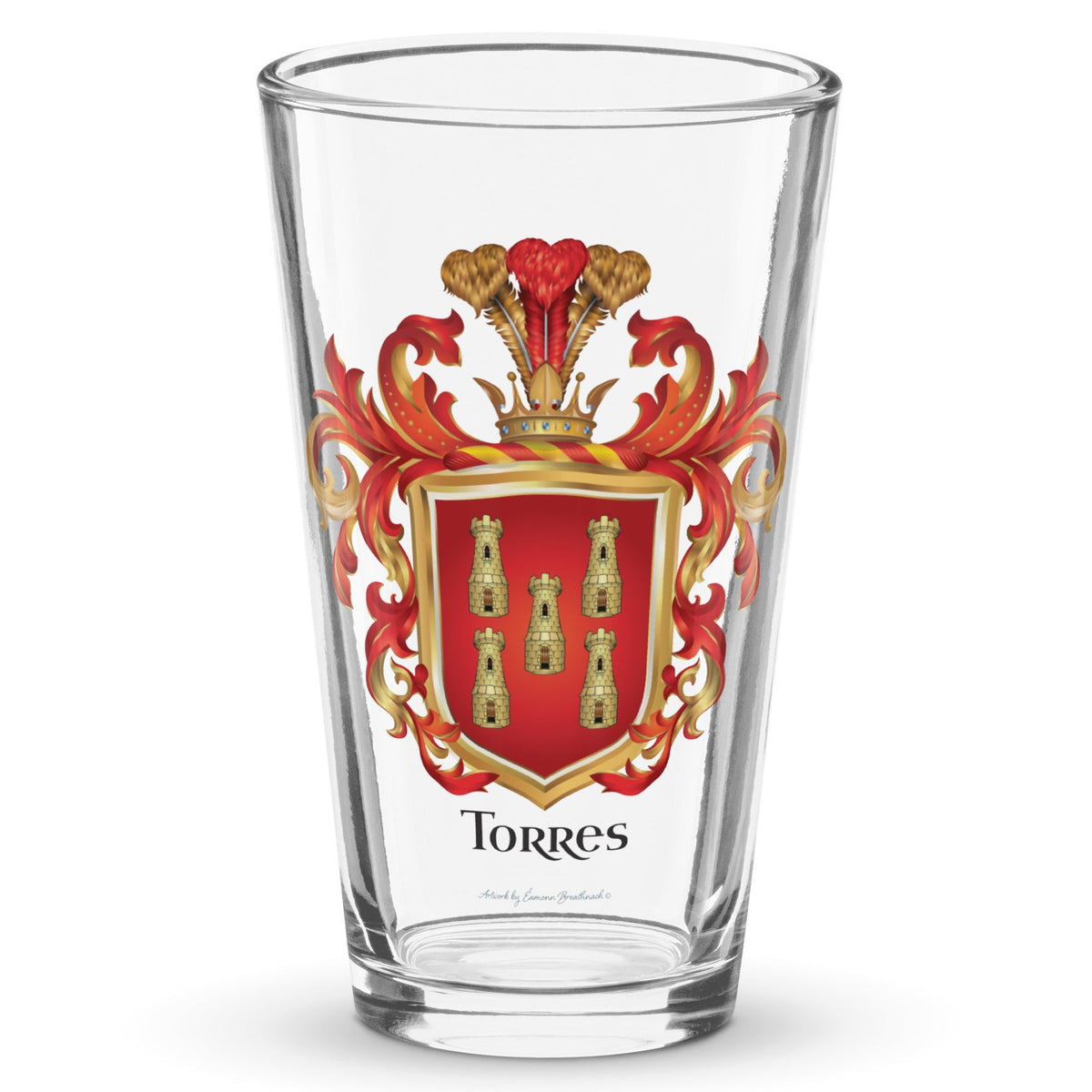 A class clear pint beer glass with a on a white background with the Torres Family Crest featuring 5 gold towers on a red shield printed on it.