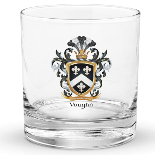 A clear classic heavy base rocks glass on a white background, printed with the Vaughn Coat of Arms featuring a black shield with a white chevron and 3 white fleur de lis.