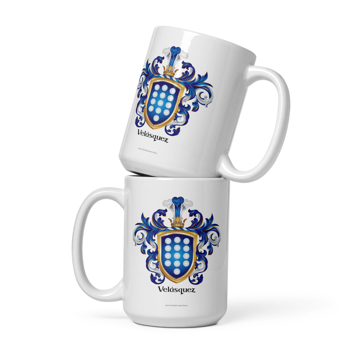 Two white ceramic mugs stacked with one on top of the other, featuring a blue and gold Velasquez family crest design on the front, set against a clean white background.