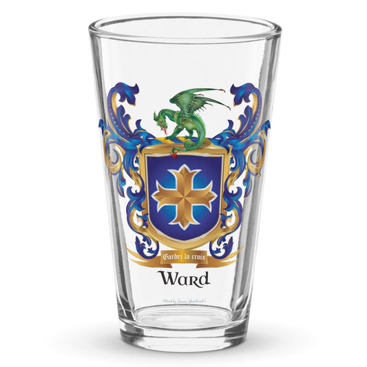 A clear classic pint beer glass on a white background, printed with the Ward Family Crest featuring a bue shield with a gold creoo and a dragon on the crest.