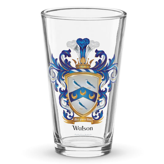 A clear classic pint beer glass on a white background, printed with the Watson Family Crest featuring 3 doves and 3 crescents.