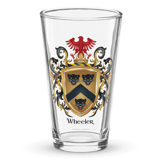 Wheeler Family Crest on a classic pint beer glass featuring the Wheeler coat of arms with 3 black leopard heads and a red eagle - Family Crests Store
