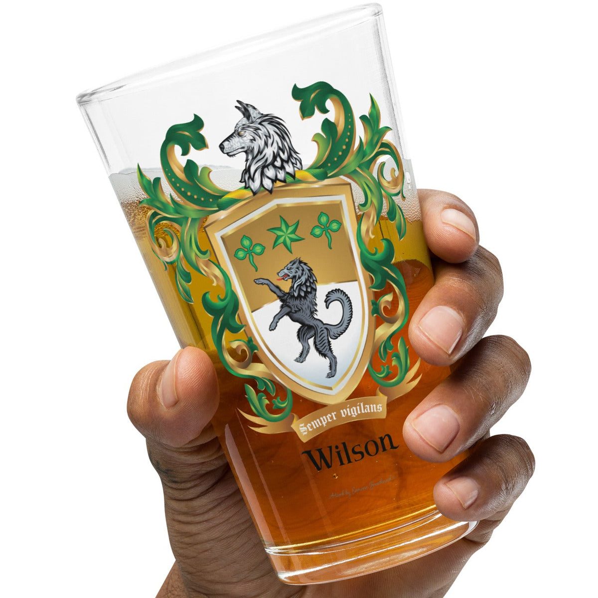 Wilson Family Crest beer glass - black wolf held up by a hand against a white background