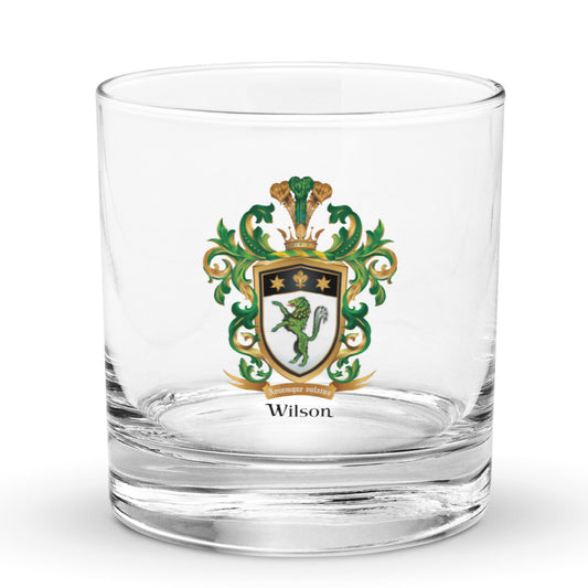 Wilson Family Crest green wolf rocks glass on white background