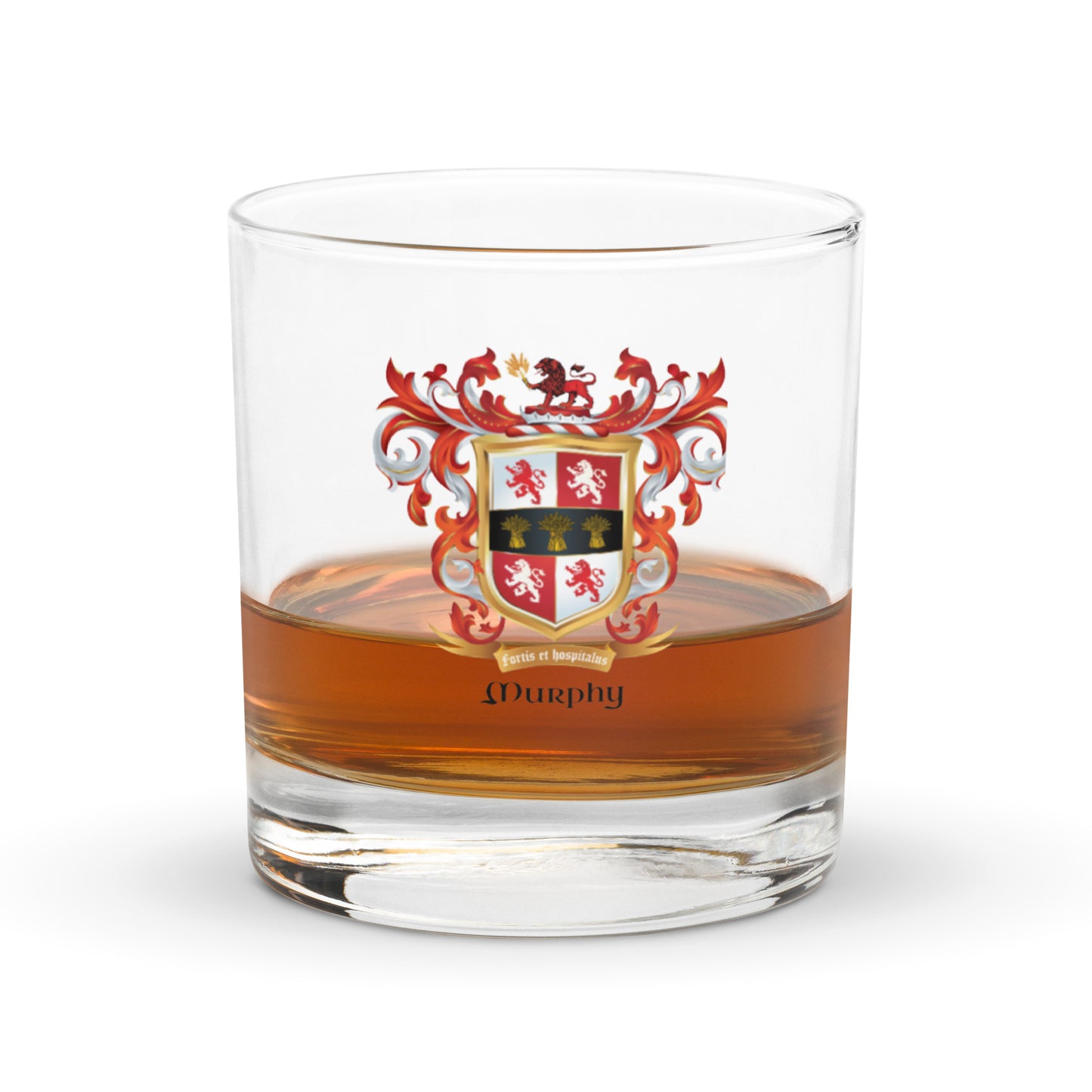 A Murphy Family Crest rocks glass with a coat of arms design and whiskey in the glass on white background