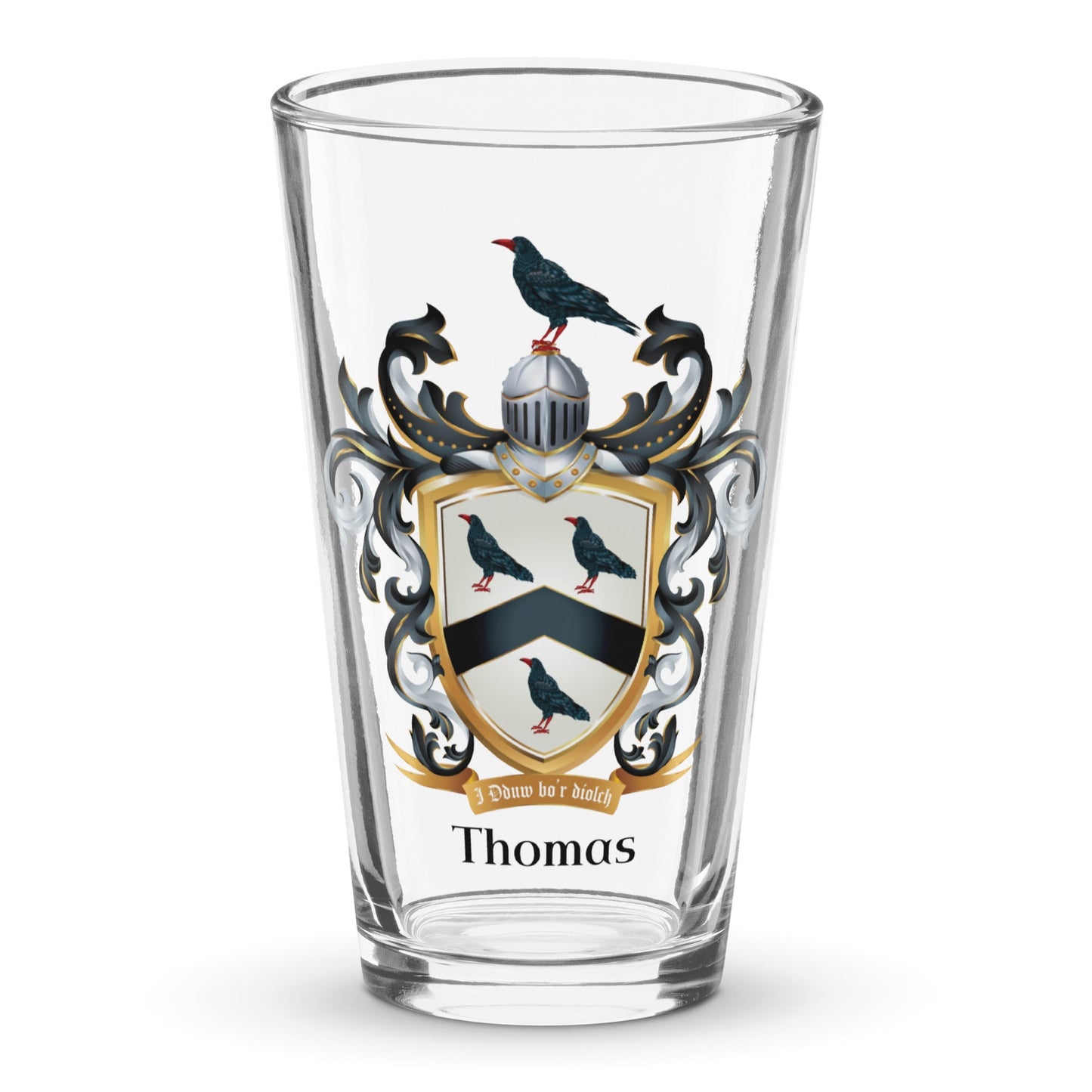 Clear glass with a Thomas Family Crest  on a white background