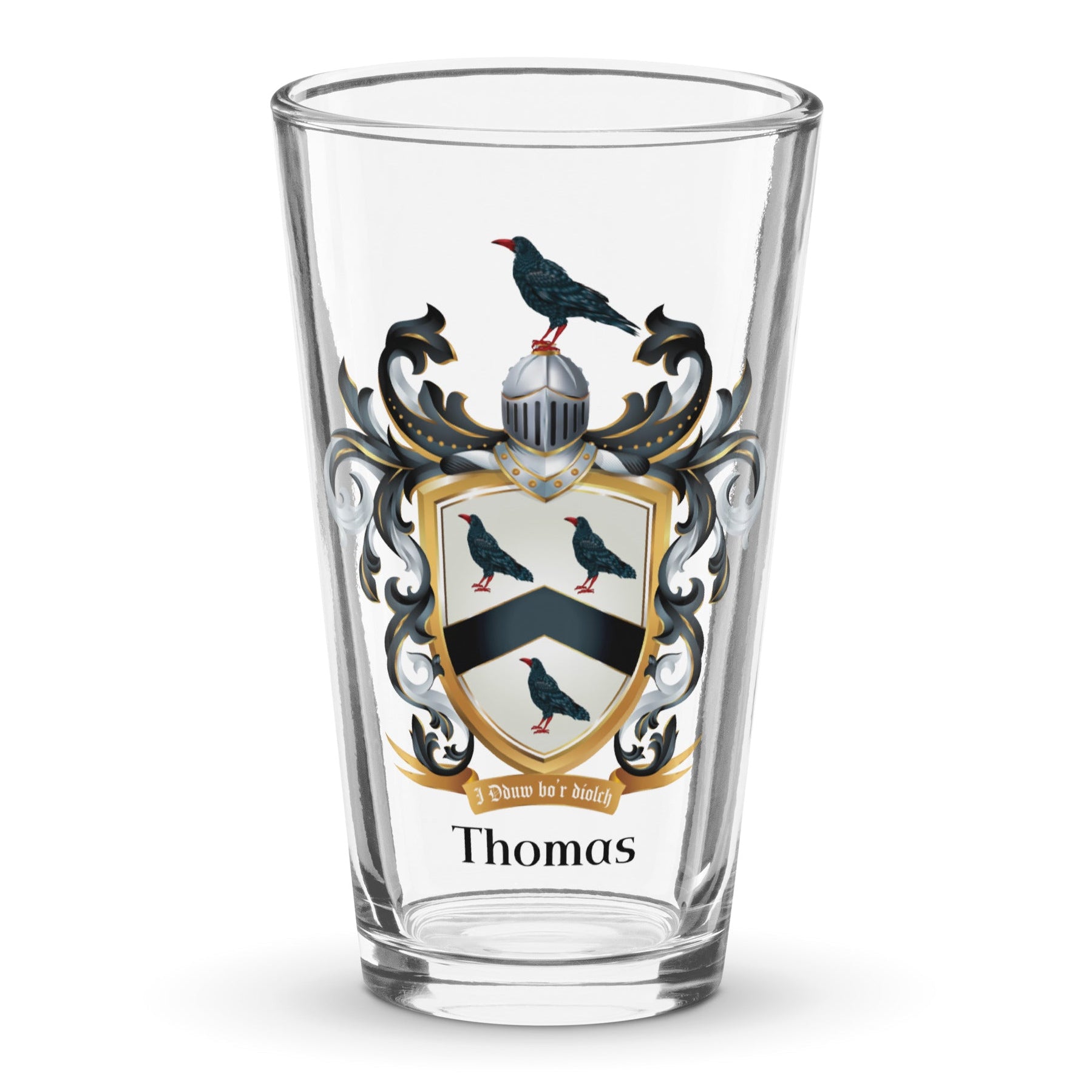 Clear glass with a Thomas Family Crest  on a white background